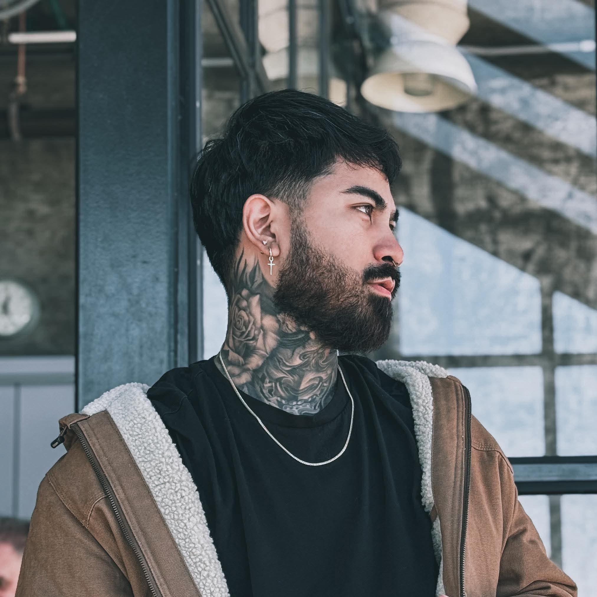 DJ - Tattoo Artist at 5 Dragons